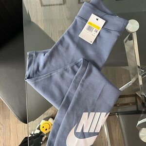 New w tags Nike leggings. Size small. The prettiest pale blue/gray color